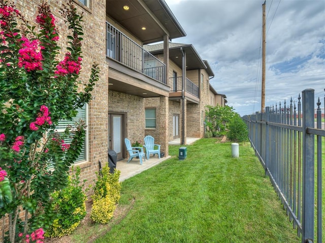 4800 Stelens Ct, Norman, OK 73071 - view of yard featuring a balcony and a patio