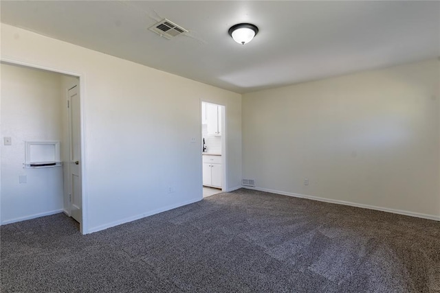 3820 SE 23rd St, Del City, OK 73115 - unfurnished room featuring carpet flooring and baseboards
