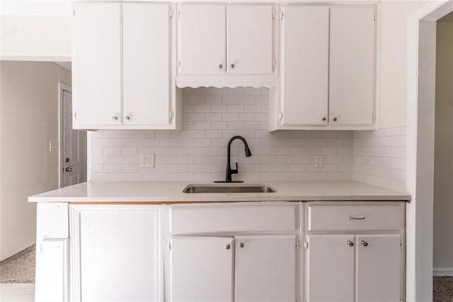 3820 SE 23rd St, Del City, OK 73115 - kitchen with decorative backsplash, light countertops, and white cabinets