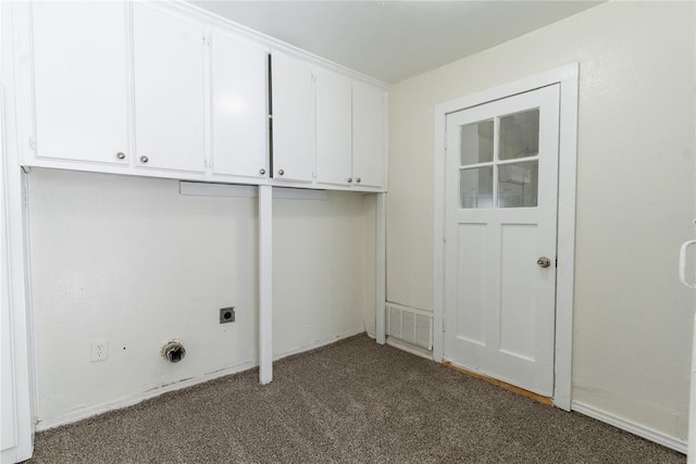 3820 SE 23rd St, Del City, OK 73115 - laundry room with electric dryer hookup, cabinet space, and carpet
