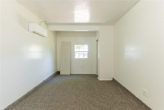 3820 SE 23rd St, Del City, OK 73115 - carpeted empty room featuring an AC wall unit and baseboards