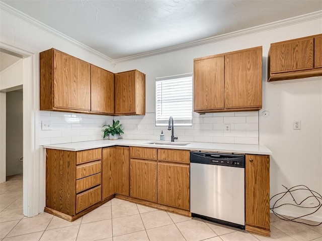 500 Dakota St, Norman, OK 73069 - kitchen with stainless steel dishwasher, brown cabinetry, light countertops, tasteful backsplash, and crown molding