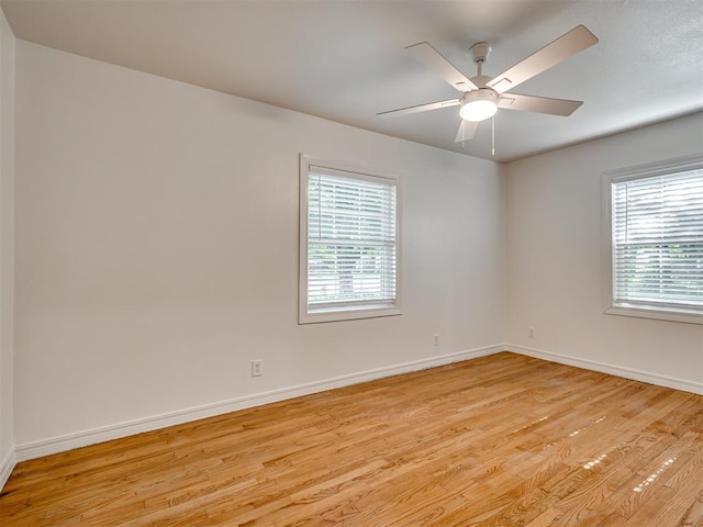 500 Dakota St, Norman, OK 73069 - empty room featuring light wood-style floors and a ceiling fan