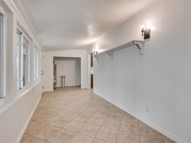 500 Dakota St, Norman, OK 73069 - unfurnished room featuring a textured ceiling and light tile patterned flooring