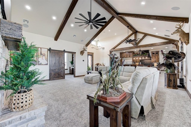 8960 N Banner Rd, Yukon, OK 73099 - living area with a barn door, carpet flooring, beam ceiling, high vaulted ceiling, and ceiling fan
