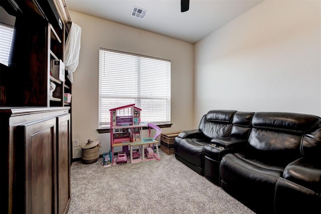8960 N Banner Rd, Yukon, OK 73099 - carpeted living room featuring ceiling fan