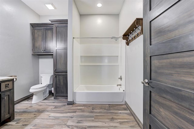 8960 N Banner Rd, Yukon, OK 73099 - bathroom featuring wood finished floors, vanity, and shower / bath combination