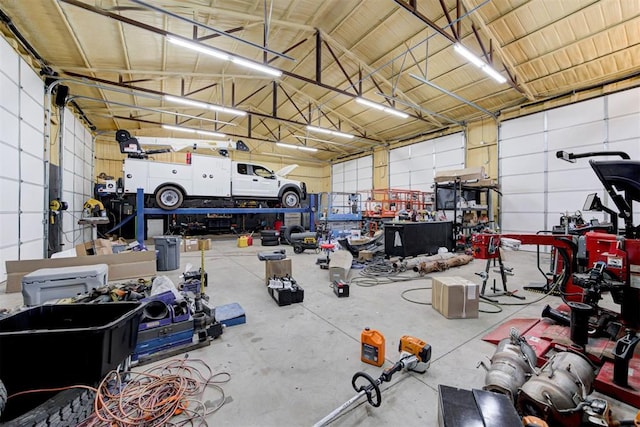 8960 N Banner Rd, Yukon, OK 73099 - garage with a workshop area and metal wall