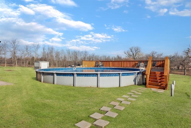 8960 N Banner Rd, Yukon, OK 73099 - swimming pool with a yard and a deck