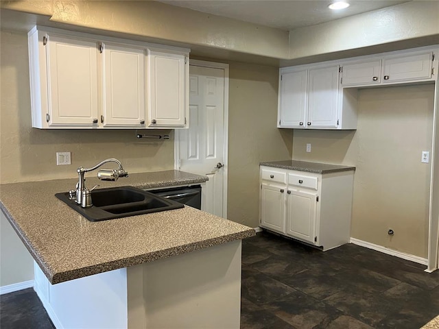 9105 Oak Creek Dr, Midwest City, OK 73130 - kitchen featuring a peninsula, white cabinets, and recessed lighting