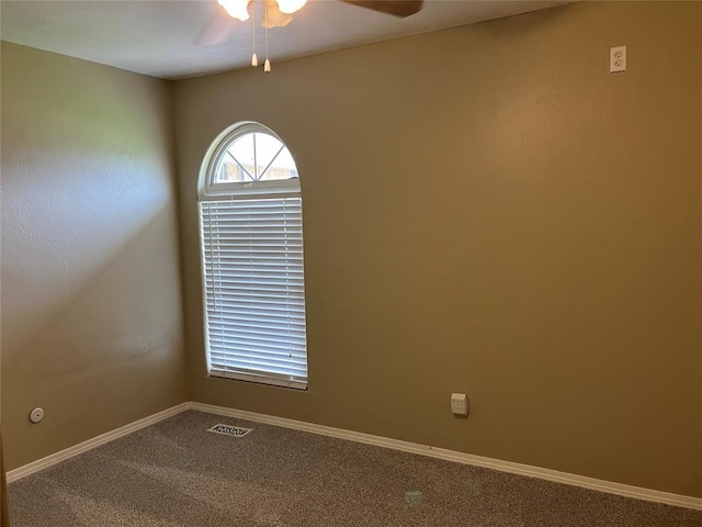 9105 Oak Creek Dr, Midwest City, OK 73130 - empty room with a ceiling fan and carpet floors