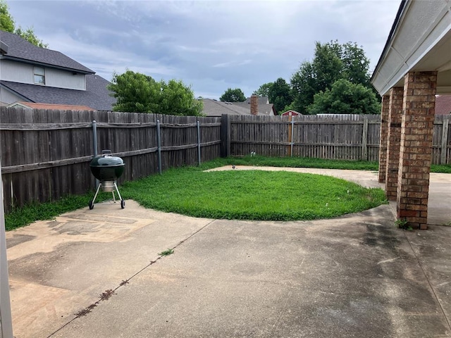 9105 Oak Creek Dr, Midwest City, OK 73130 - fenced backyard with a patio area