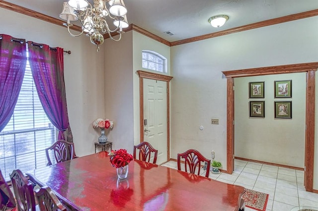 645 SW 160th St, Oklahoma City, OK 73170 - dining space featuring a chandelier, crown molding, and light tile patterned floors