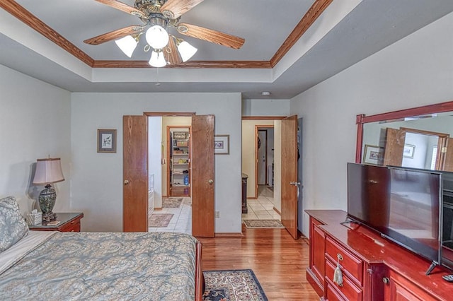 645 SW 160th St, Oklahoma City, OK 73170 - bedroom with a raised ceiling, ornamental molding, and light wood-type flooring
