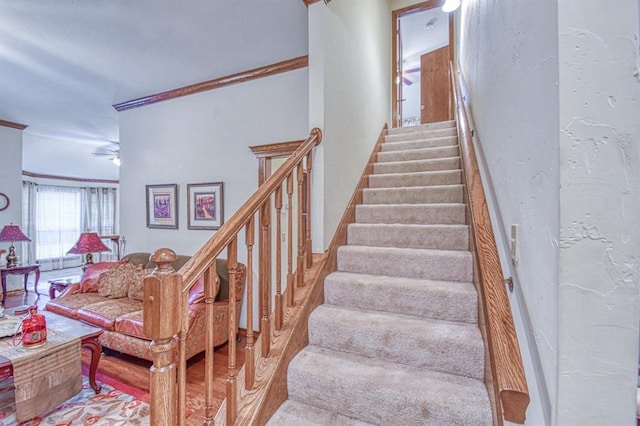 645 SW 160th St, Oklahoma City, OK 73170 - stairs featuring ornamental molding and a ceiling fan