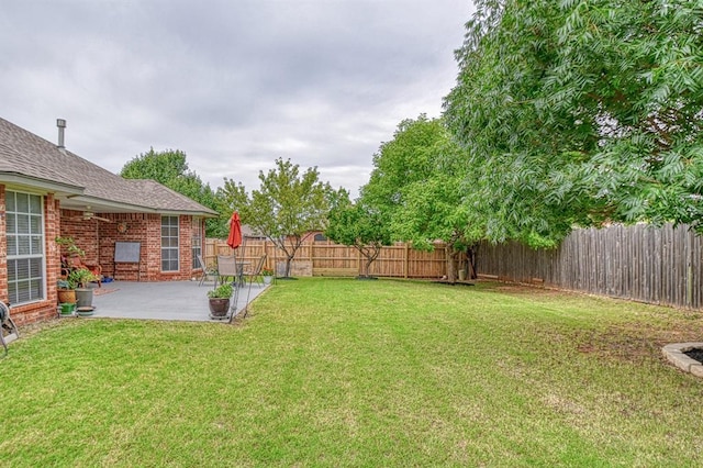 645 SW 160th St, Oklahoma City, OK 73170 - fenced backyard with a patio