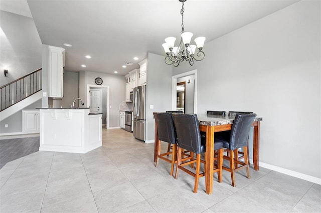 9024 NW 79th Ter, Yukon, OK 73099 - dining room with a chandelier, stairs, recessed lighting, and light tile patterned floors