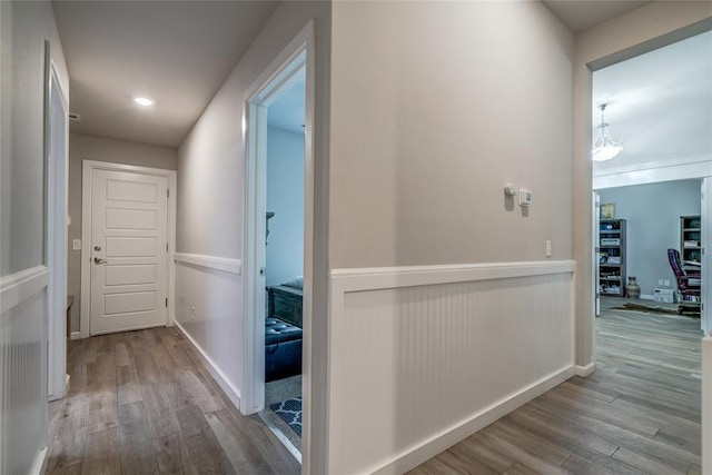 14812 Deerbrook Blvd, Oklahoma City, OK 73142 - hallway featuring wood finished floors and baseboards