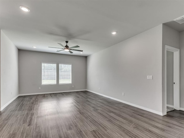 4205 Palmetto Bluff Dr, Mustang, OK 73064 - empty room featuring a ceiling fan, dark wood-style flooring, and recessed lighting