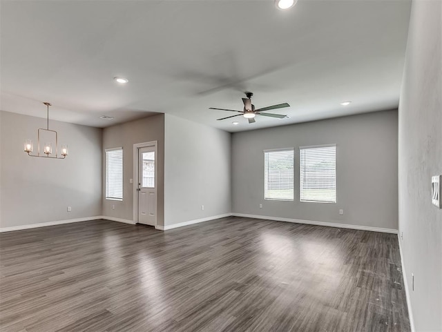 4205 Palmetto Bluff Dr, Mustang, OK 73064 - spare room featuring ceiling fan, recessed lighting, a chandelier, and dark wood-style flooring