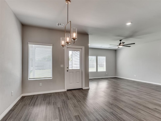 4205 Palmetto Bluff Dr, Mustang, OK 73064 - entrance foyer featuring dark wood-type flooring, a ceiling fan, and a chandelier