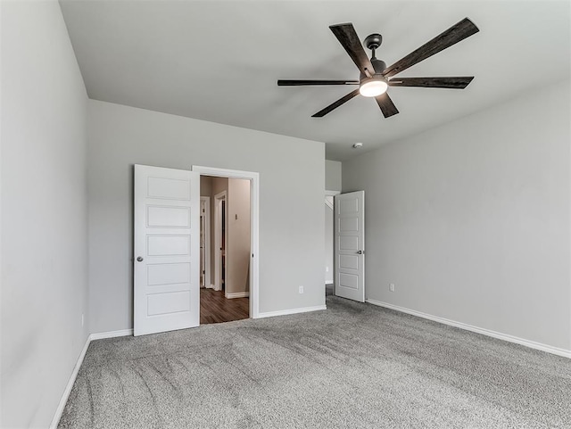4205 Palmetto Bluff Dr, Mustang, OK 73064 - unfurnished bedroom featuring carpet floors and a ceiling fan