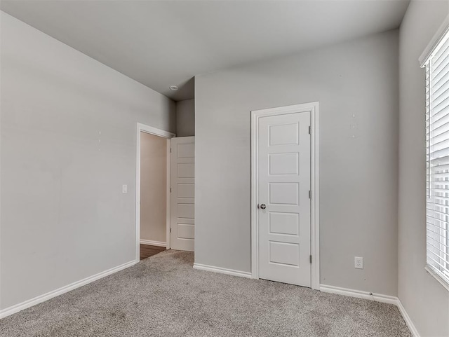 4205 Palmetto Bluff Dr, Mustang, OK 73064 - unfurnished bedroom with carpet flooring and baseboards