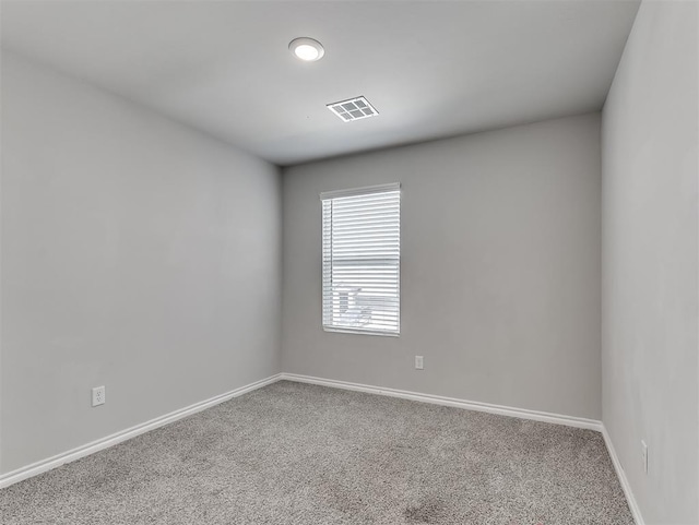 4205 Palmetto Bluff Dr, Mustang, OK 73064 - spare room with carpet floors and baseboards