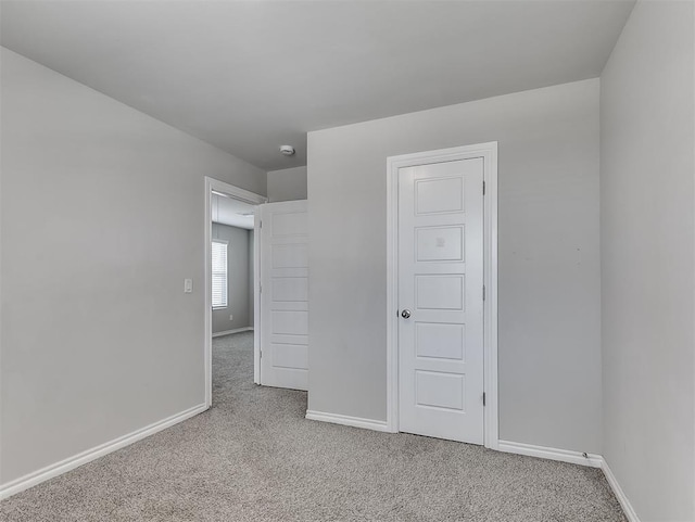 4205 Palmetto Bluff Dr, Mustang, OK 73064 - unfurnished bedroom featuring carpet and baseboards
