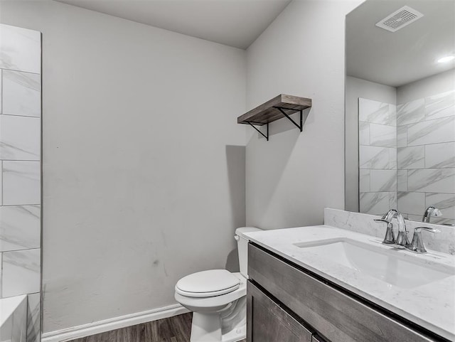 4205 Palmetto Bluff Dr, Mustang, OK 73064 - bathroom with wood finished floors and vanity