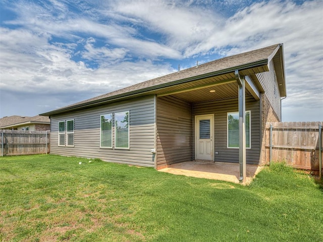 4205 Palmetto Bluff Dr, Mustang, OK 73064 - rear view of house featuring a patio
