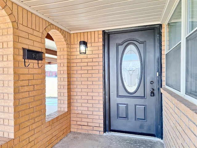 4713 Meench Dr, Del City, OK 73115 - doorway to property featuring brick siding
