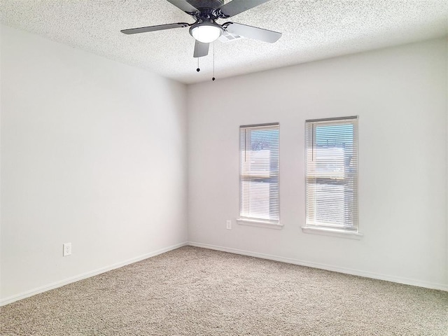 4713 Meench Dr, Del City, OK 73115 - carpeted spare room featuring a textured ceiling and ceiling fan