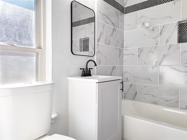 4713 Meench Dr, Del City, OK 73115 - full bath featuring a textured wall, vanity, and bathtub / shower combination