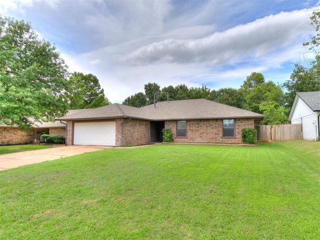 17 Pueblo, Edmond, OK 73013 - single story home featuring a garage, brick siding, and concrete driveway