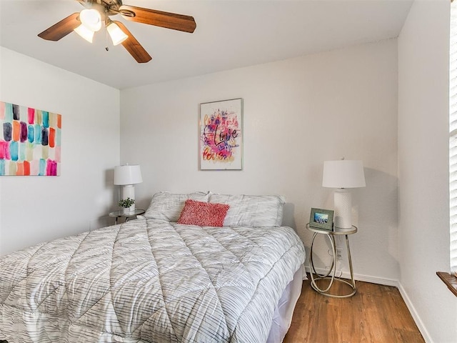 17 Pueblo, Edmond, OK 73013 - bedroom with wood finished floors and a ceiling fan