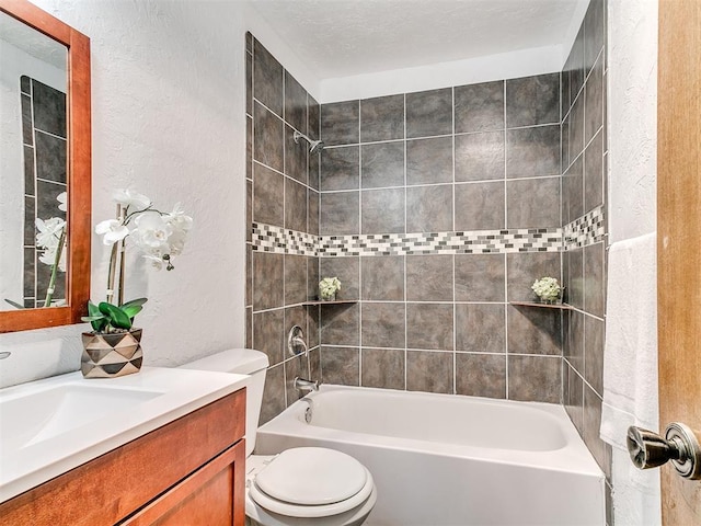 17 Pueblo, Edmond, OK 73013 - full bath with vanity, a textured wall, and washtub / shower combination
