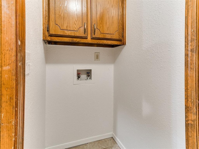 17 Pueblo, Edmond, OK 73013 - washroom with cabinet space and hookup for a washing machine