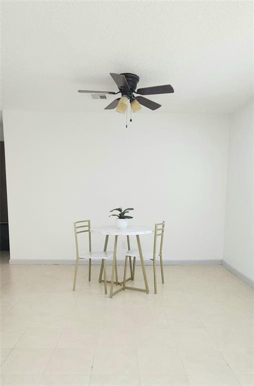 537 NW 114th St, Oklahoma City, OK 73114 - empty room featuring baseboards and a ceiling fan