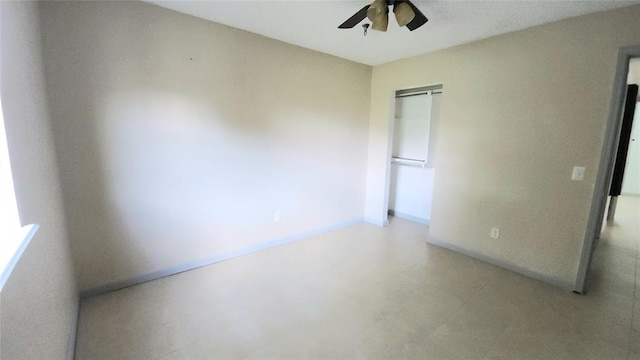 537 NW 114th St, Oklahoma City, OK 73114 - unfurnished bedroom with light flooring, a closet, and ceiling fan
