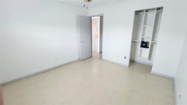 537 NW 114th St, Oklahoma City, OK 73114 - unfurnished bedroom with baseboards and a closet
