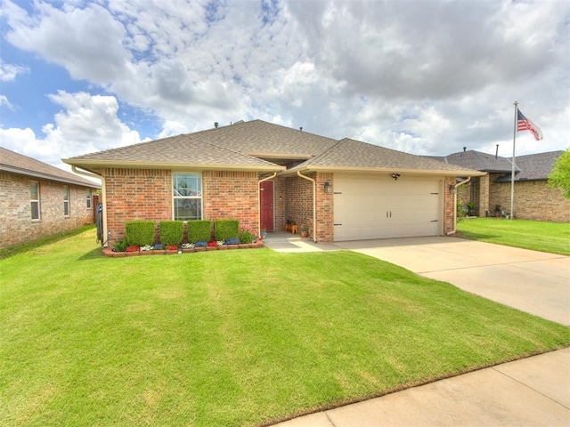 8025 Waters Edge Way, Del City, OK 73135 - view of front facade with a garage, concrete driveway, a front yard, and brick siding