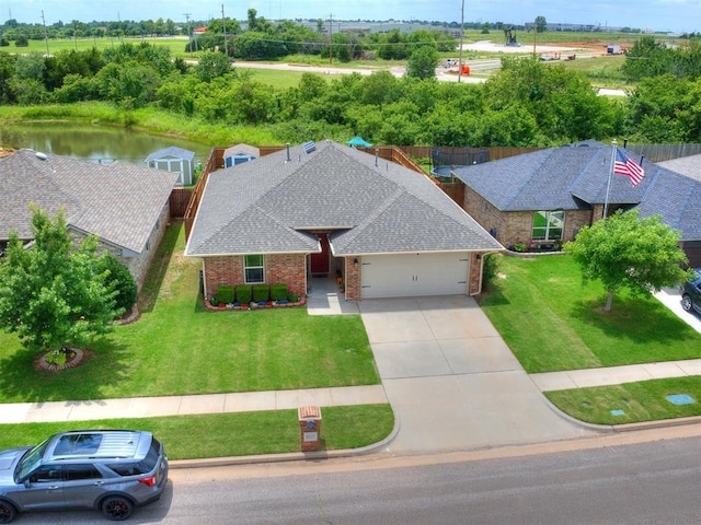 8025 Waters Edge Way, Del City, OK 73135 - view from above of property with a nearby body of water