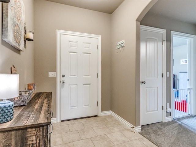 8025 Waters Edge Way, Del City, OK 73135 - entrance foyer with arched walkways and light tile patterned floors