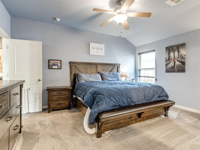 8025 Waters Edge Way, Del City, OK 73135 - bedroom featuring light colored carpet, lofted ceiling, and a ceiling fan