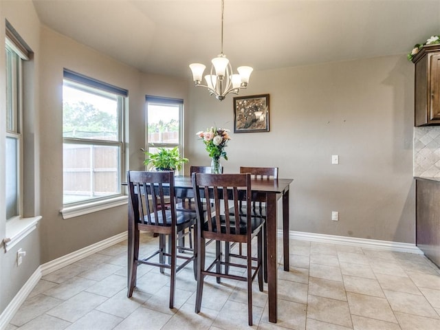 8025 Waters Edge Way, Del City, OK 73135 - dining area with a chandelier and light tile patterned floors
