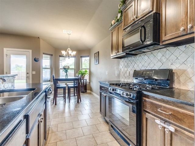 8025 Waters Edge Way, Del City, OK 73135 - kitchen featuring black appliances, a chandelier, decorative backsplash, light tile patterned floors, and pendant lighting