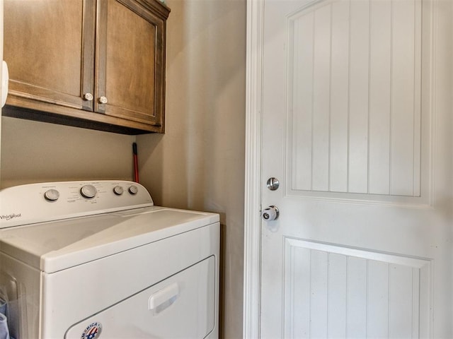 8025 Waters Edge Way, Del City, OK 73135 - laundry area with washer / clothes dryer and cabinet space