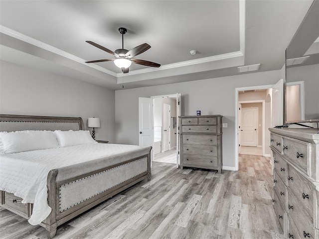 11604 SW 9th St, Yukon, OK 73099 - bedroom with a raised ceiling, light wood-type flooring, ornamental molding, and a ceiling fan