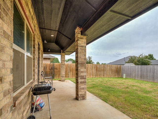 11604 SW 9th St, Yukon, OK 73099 - fenced backyard featuring a patio area and a grill